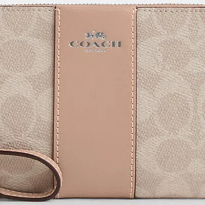 Coach Corner Zip Wristlet In Signature Canvas With Stripe In Beige