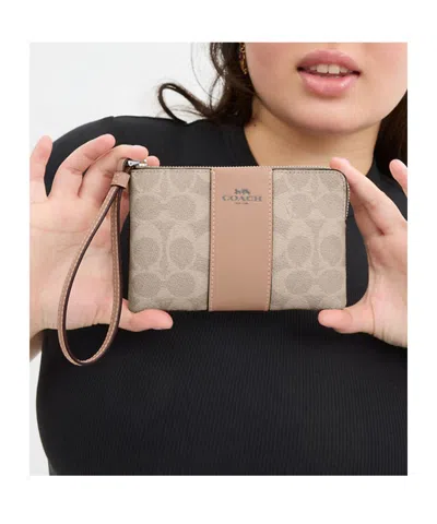 Coach Corner Zip Wristlet In Signature Canvas With Stripe In Beige