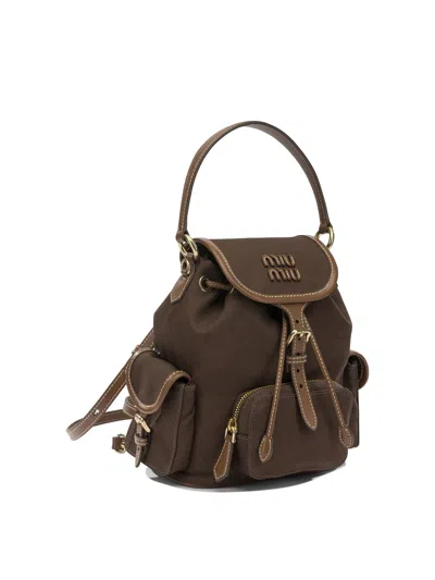 Miu Miu Medium Canvas Leather Backpack Top Handle In Brown