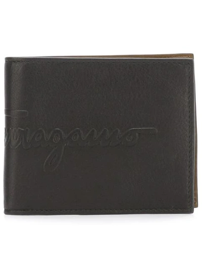 Shop Ferragamo Embossed Logo Wallet