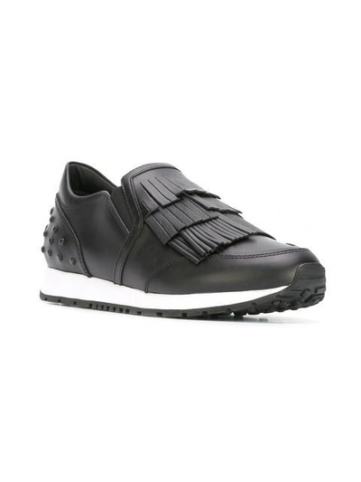 Shop Tod's Fringed Sneakers