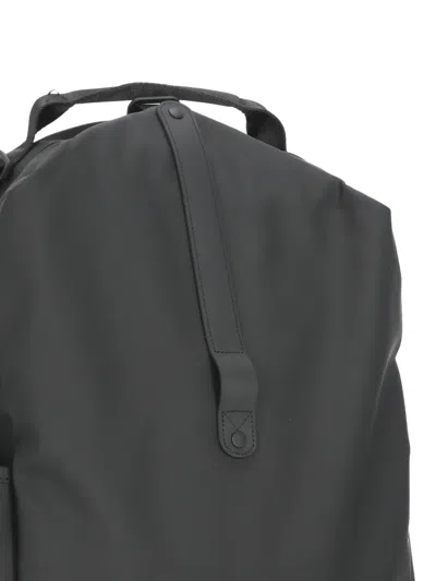 Rains Clip Front Backpack In Black