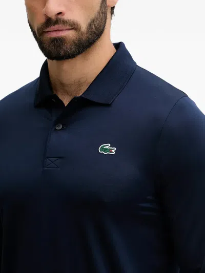 Lacoste Regular Fit Ultra Dry Long Sleeved Golf Polo In Blue