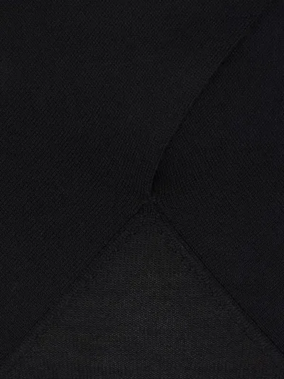Totême Wool And Silk-blend Turtleneck Sweater In Black