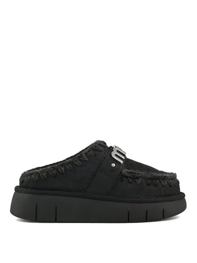 Mou Moccasin-inspired Black Slip-on Ankle Boots With Whipstitch Detailing In Black