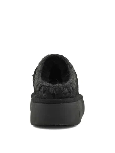 Mou Moccasin-inspired Black Slip-on Ankle Boots With Whipstitch Detailing In Black