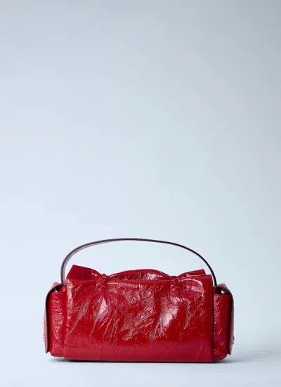Acne Studios Multipocket Crinkle Patent Leather Top Handle Bag In Red