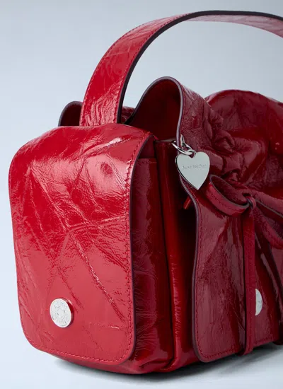 Acne Studios Multipocket Crinkle Patent Leather Top Handle Bag In Red