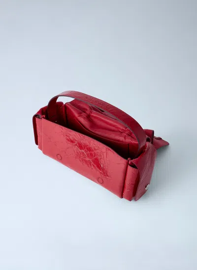 Acne Studios Multipocket Crinkle Patent Leather Top Handle Bag In Red