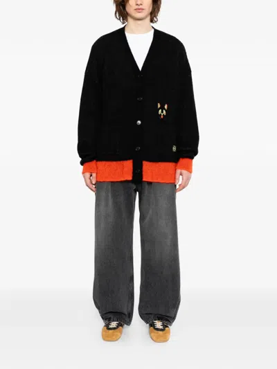 Loewe Embossed Leather-patch Jeans In Brown