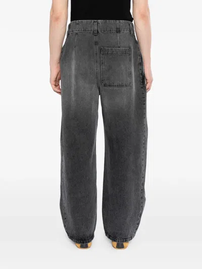 Loewe Embossed Leather-patch Jeans In Brown