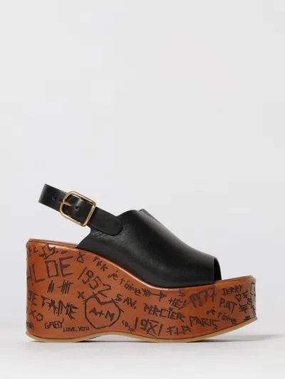 Chloé Maxime Black Wedge With Engraved Written Decorations And Logo Buckle In Leather Woman In Black