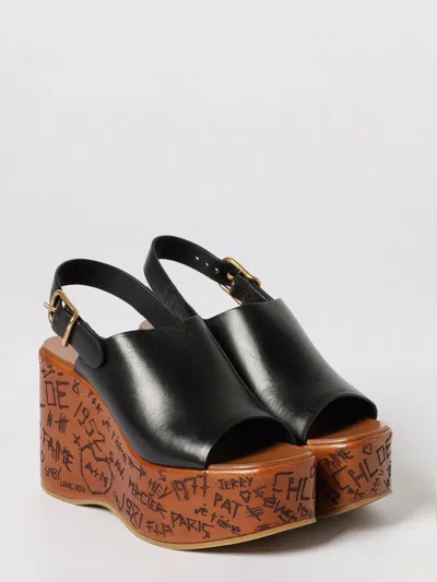 Chloé Maxime Black Wedge With Engraved Written Decorations And Logo Buckle In Leather Woman In Black