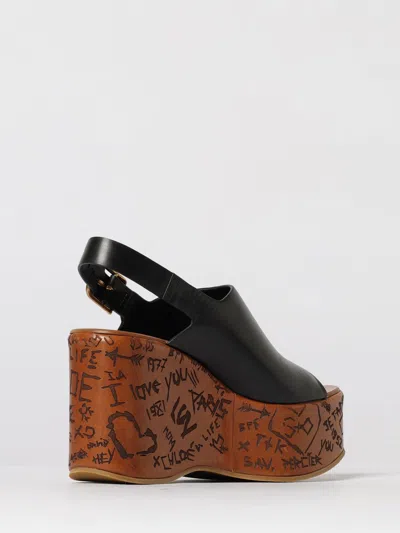 Chloé Maxime Black Wedge With Engraved Written Decorations And Logo Buckle In Leather Woman In Black