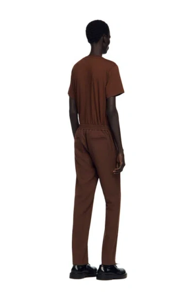 Sandro Regular Washed-effect Jeans In Brown