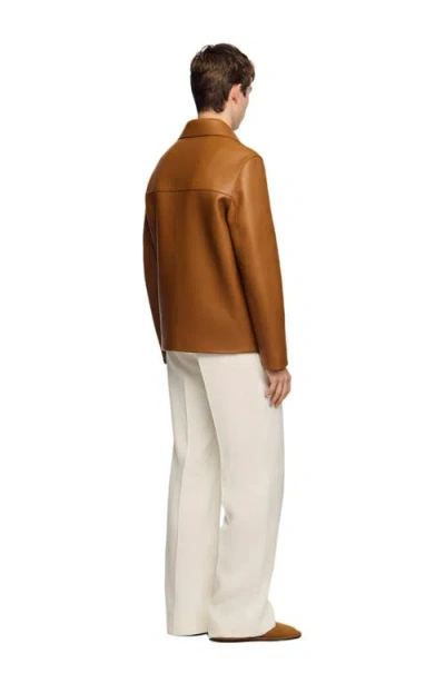 Sandro Buttoned Lambskin Jacket In Brown