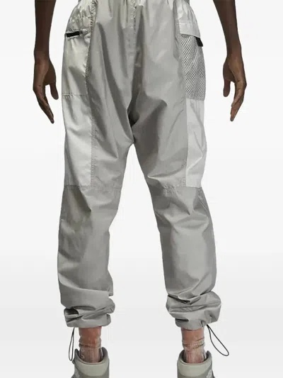 Jordan Drawstring Track Pants In Gray
