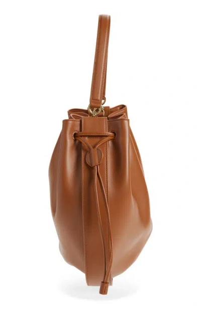 Ferragamo Hug Buckle Leather Bucket Bag In Brown