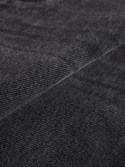 B Sides Buttoned Jeans In Black