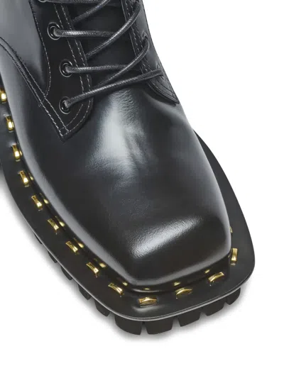 Balmain Glazed Leather Studded Boots In Black