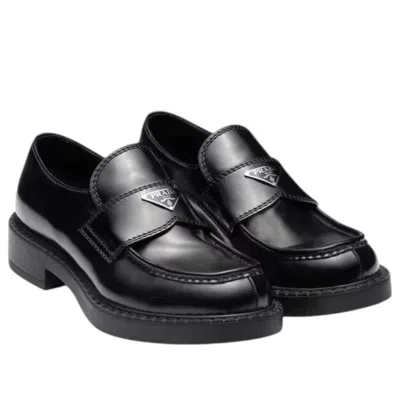 Prada Triangle Logo Brushed Leather Loafers In Black