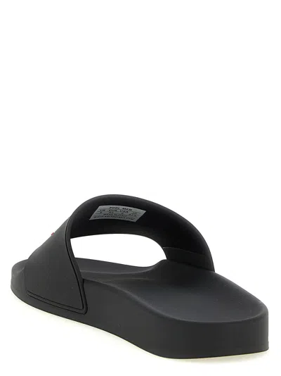 Balenciaga Embossed Logo Slip-on Sandals With Moulded Footbed In Black