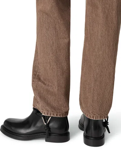 Bottega Veneta Women Black Ankle Boots With Metallic Detail On The Side And Applied Laces In Leather