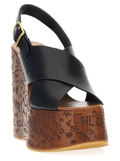 Chloé Maxime Black Wedges With High Embossed High Wedge Heel And Crossover Strap On The Toe In Leather Wom In Black