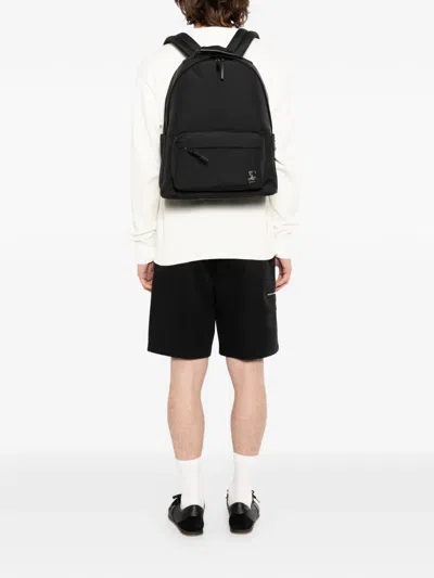 Agnès B. Logo-patched Zip Backpack In Black