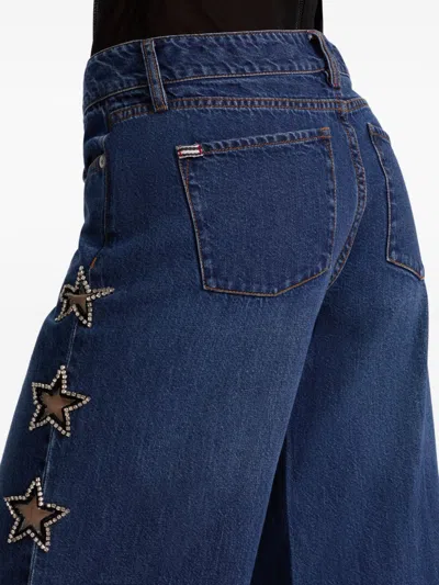 Alice And Olivia Amazing Low Rise Wide Leg Snap Trim Jeans In Cambria Vintage In Blue