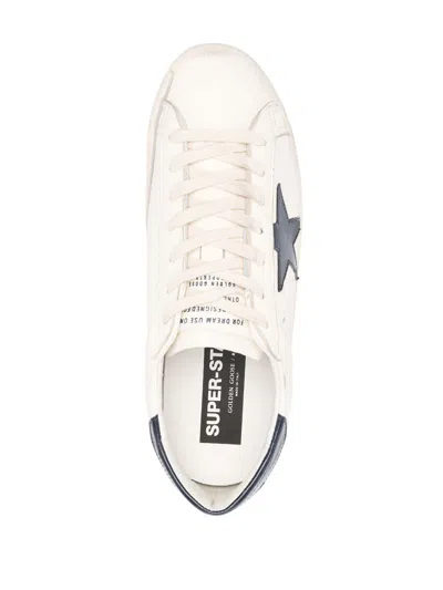 Golden Goose Super-star White Low Top Sneakers With Embossed Logo And Contrasting Heel Tab In Leather Man In Black
