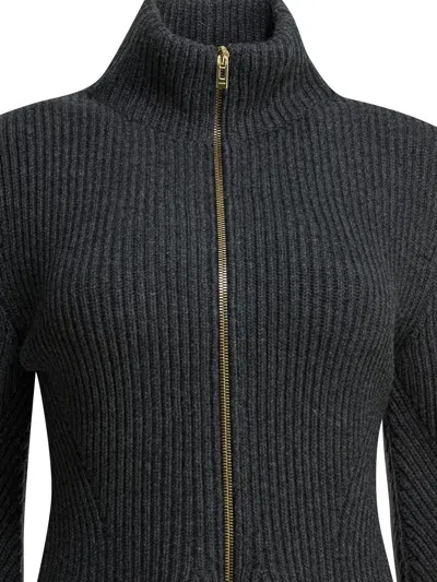 Alaïa Ribbed Wool And Cashmere-blend Peplum Zip-up Cardigan In Black