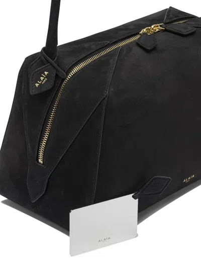 Alaïa Le Bouledogue Bowling Shoulder Bag In Nubuck Leather In Black