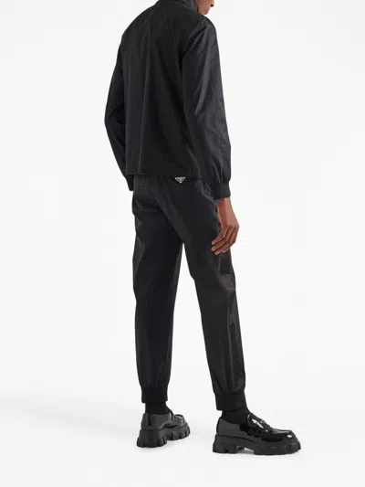 Prada Triangle-logo Silk-blend Track Pants In Black