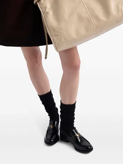 Prada Brushed Leather Loafers In Black
