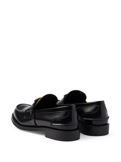 Prada Brushed Leather Loafers In Black