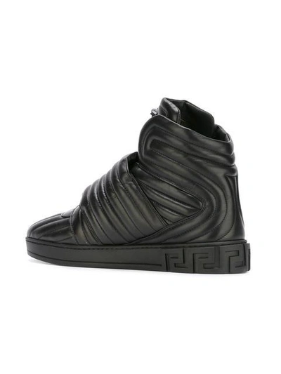 Shop Versace Palazzo Medusa Quilted Hi-top Sneakers - Black