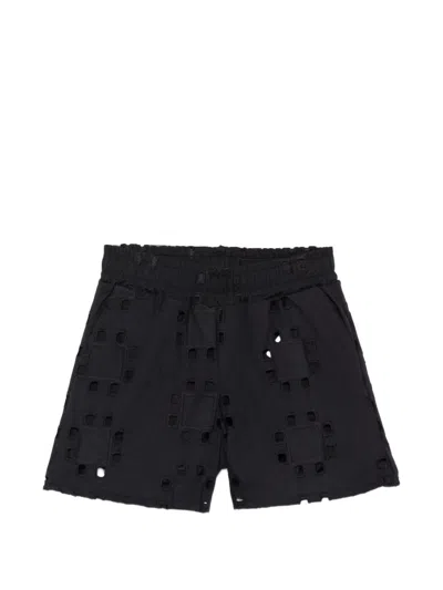 Msgm Perforated Shorts In Black