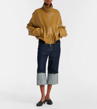 Khaite Boyle Cuffed Straight-leg Capri Jeans In Black