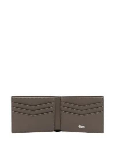 Lacoste Small Logo-debossed Billfold In Brown