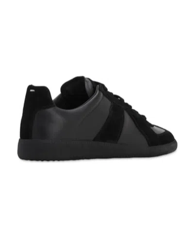 Maison Margiela Low Top Sneakers Featuring Suede Panels In Black