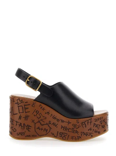 Chloé Maxime Black Wedge With Engraved Written Decorations And Logo Buckle In Leather Woman