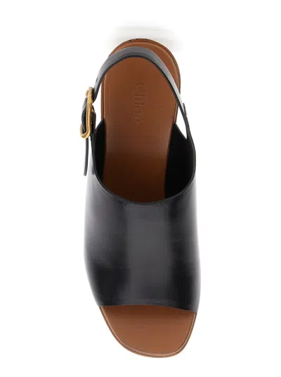 Chloé Maxime Black Wedge With Engraved Written Decorations And Logo Buckle In Leather Woman