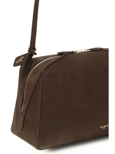 Alaïa Le Bouledogue Bowling Shoulder Bag In Nubuck Leather In Brown