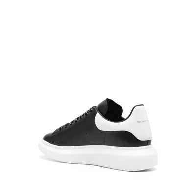 Alexander Mcqueen Black Low Top Sneakers With Logo Lettering On The Tongue In Leather Man