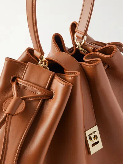 Ferragamo Hug Buckle Leather Bucket Bag In Brown