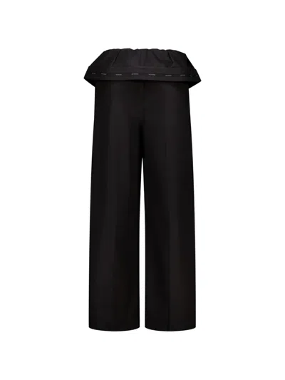 We11 Done Folded Button-fastening Trousers In Black