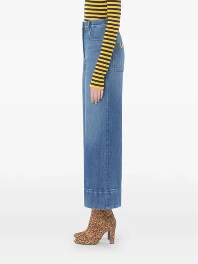 Valentino Cuffed Ankle Jeans With Front Button And Zip Closure In Blue