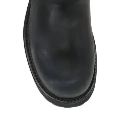 Balenciaga Venom Boots In Worn-out Effect Leather Shoes In Black