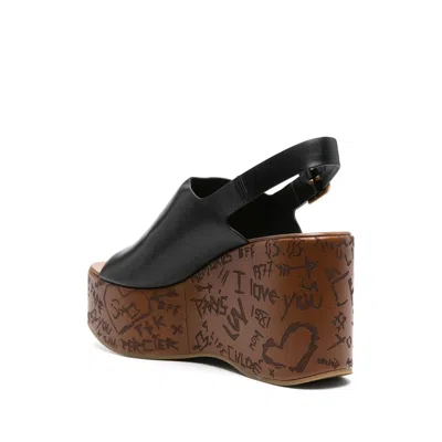 Chloé Maxime Black Wedge With Engraved Written Decorations And Logo Buckle In Leather Woman In Black